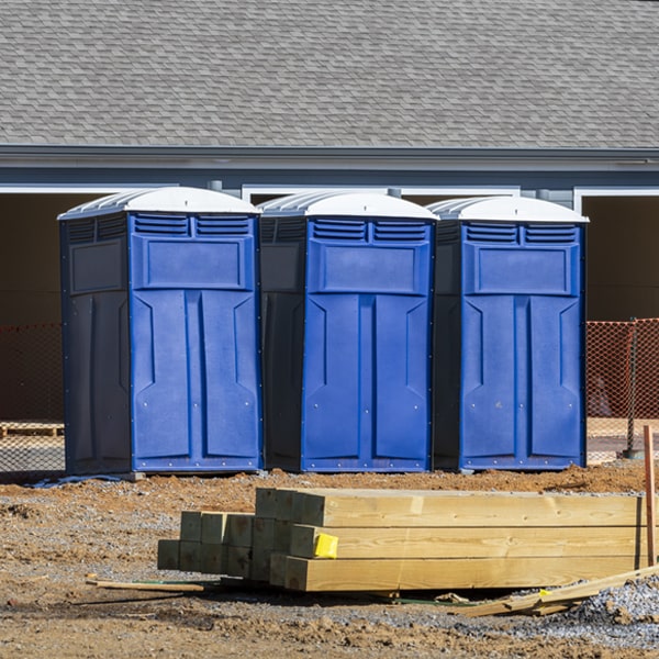 what is the cost difference between standard and deluxe portable toilet rentals in Conneaut